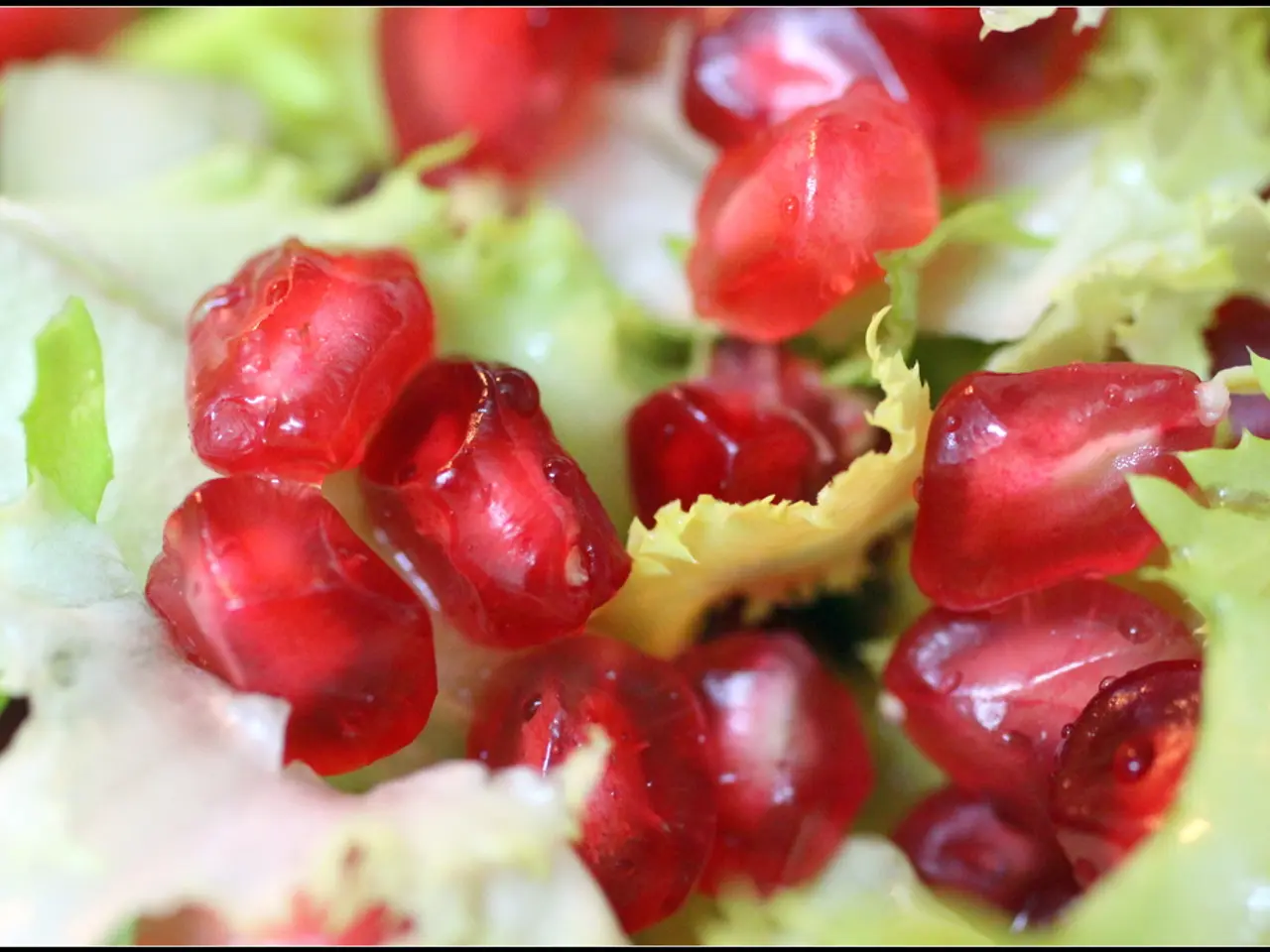 In this picture, it seems to be a dish, which includes pomegranates and other items in it.