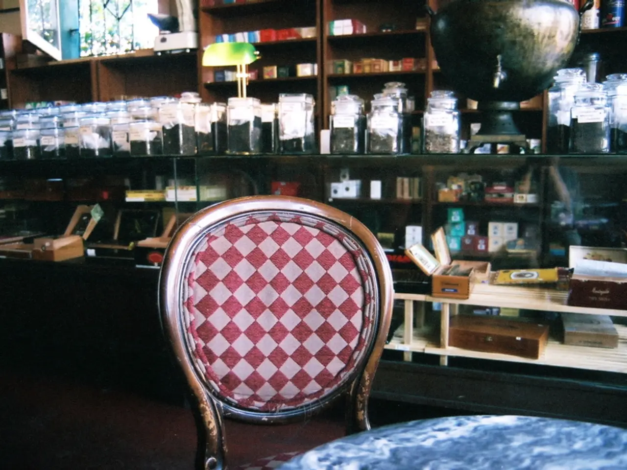 In this image we can see inside of a store. There are many objects placed on the shelves. There are...