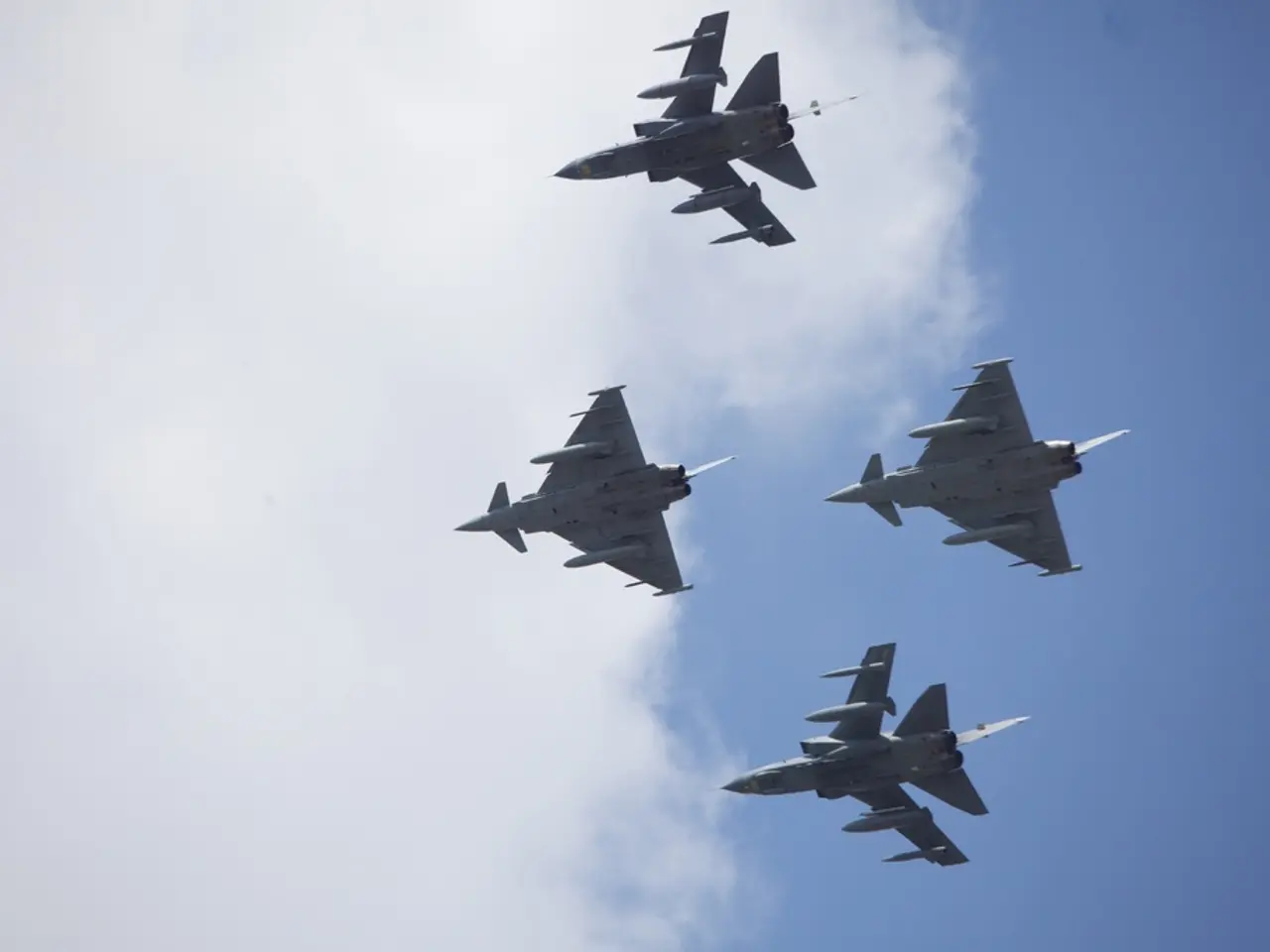 In this image we can see airplanes flying in the sky.