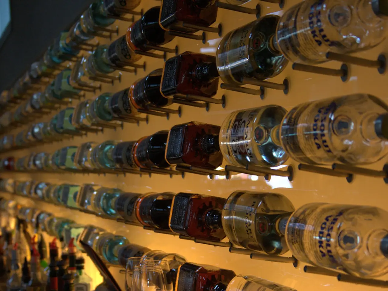As we can see in the image, there are lot of bottles arranged in a sequence.