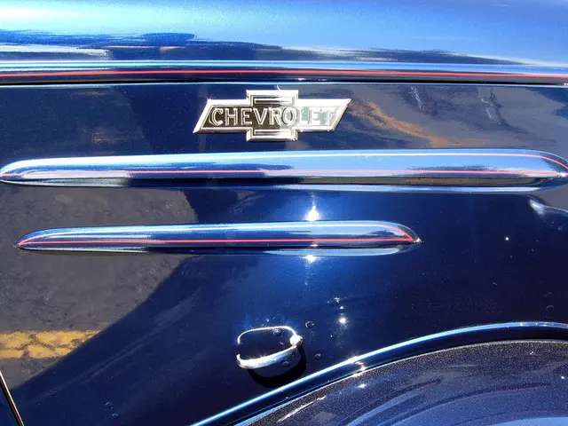 In this image we can see a logo on a motor vehicle.