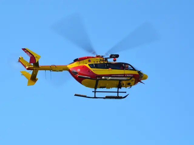 In the center of the image we can see a helicopter flying in the sky.