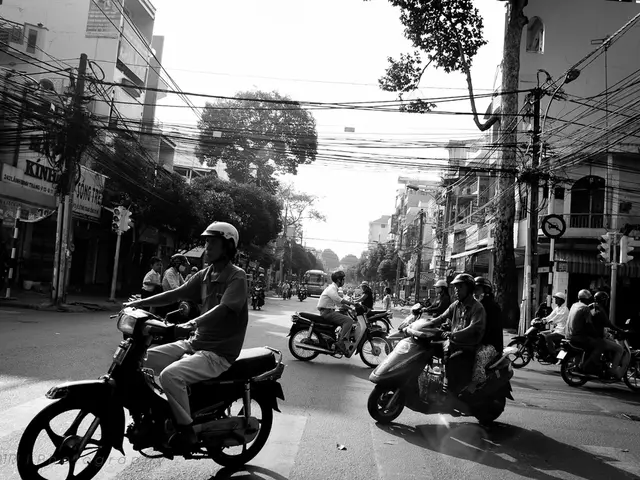 On a road there are few people riding on bike and and there is a bus on road. On the other side...