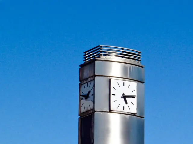 In the center of the image, we can see a clock tower and in the background, there are clouds in the...